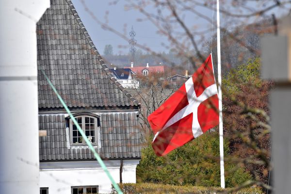 The Danish flag is at half mast at Hojvangskolen in Aarhus, Denmark, the school attended by the children of Danish billionaire and owner of fashion business Bestseller Anders Holch Povelsen.