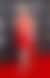 Julia Garner in a see-through red Ferragamo dress. 