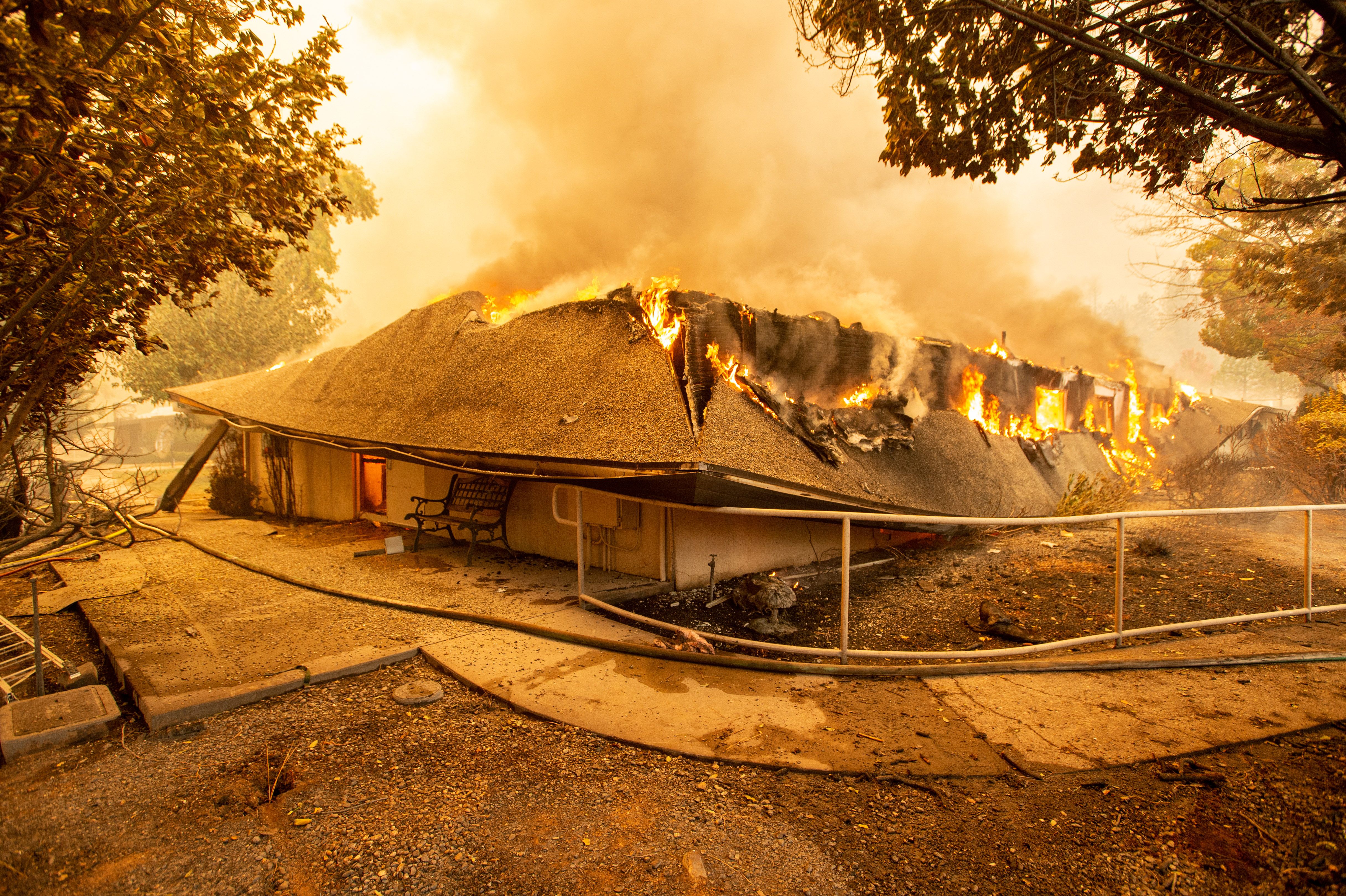 The Feather River Hospital burns down during the Camp fire in Paradise, California on November 8, 2018.