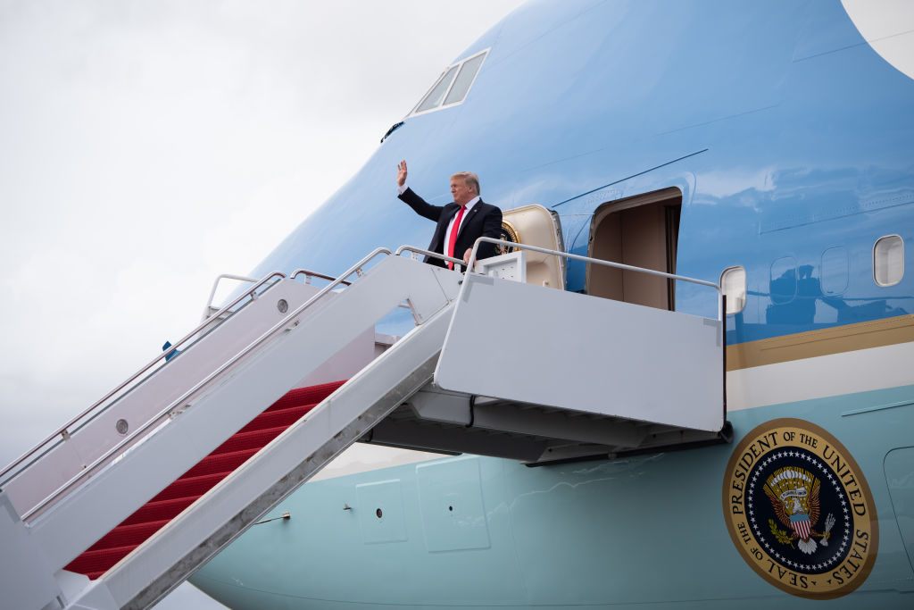 President Donald Trump disembarks from Air Force One upon arrival at Tampa International Airport in Tampa, Florida, July 31, 2018. 