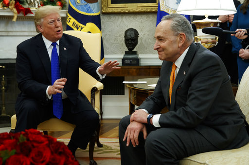 President Trump speaks to Senate Minority Leader Chuck Schumer, D-N.Y., during a meeting with Democratic leadership in the Oval Office of the White House on Dec. 11, 2018, in Washington.
