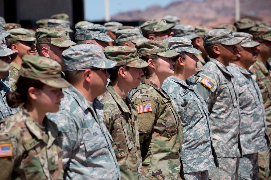 Members of the Arizona National Guard listen to instructions on April 9, 2018, at the Papago Park Military Reservation in Phoenix. Arizona deployed its first 225 National Guard members to the Mexican border on Monday after President Donald Trump ordered thousands of troops to the frontier region to combat drug trafficking and illegal immigration