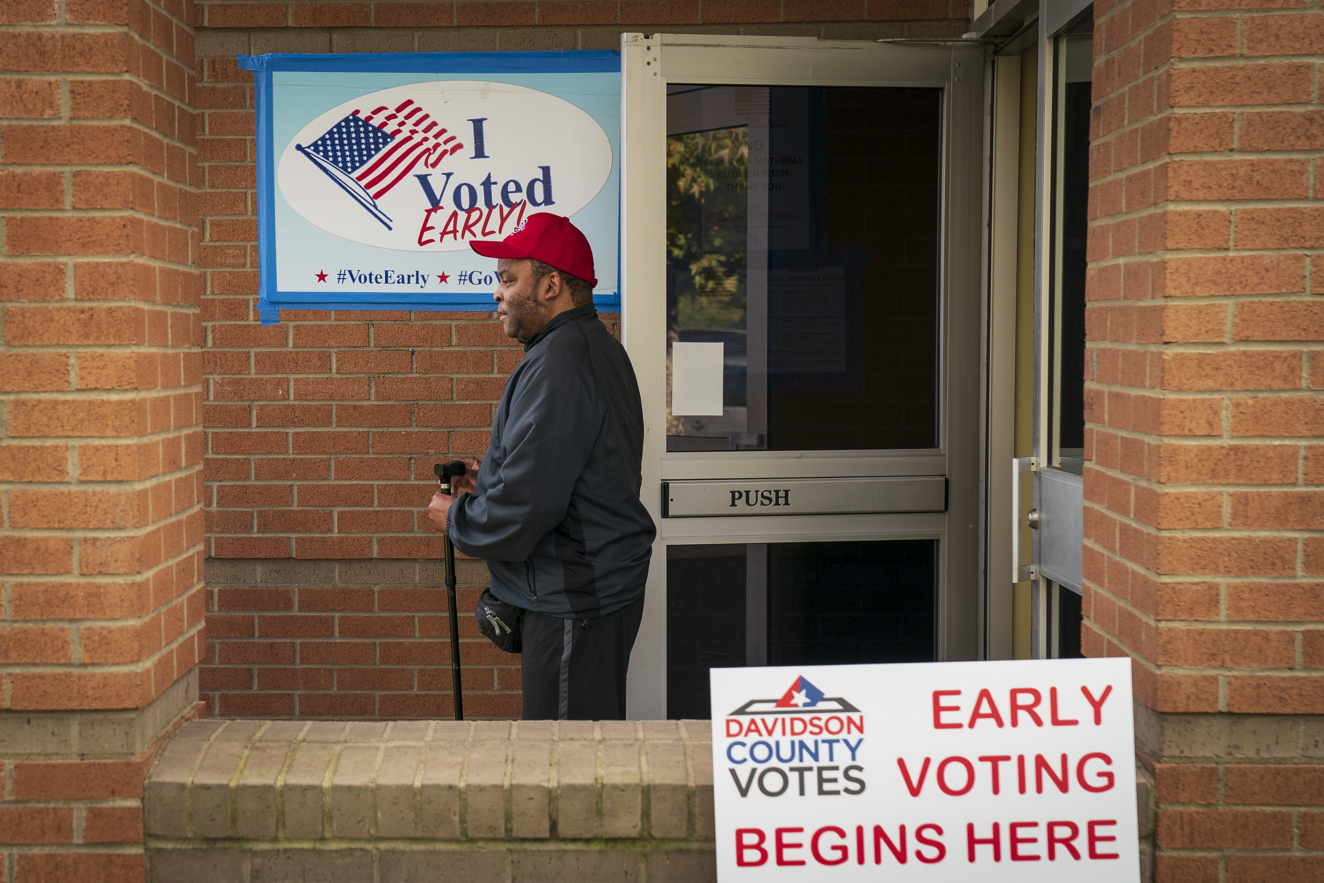 A voter exits a polling place during early voting at the Bordeaux Branch of the Nashville Public Library on Tuesday.