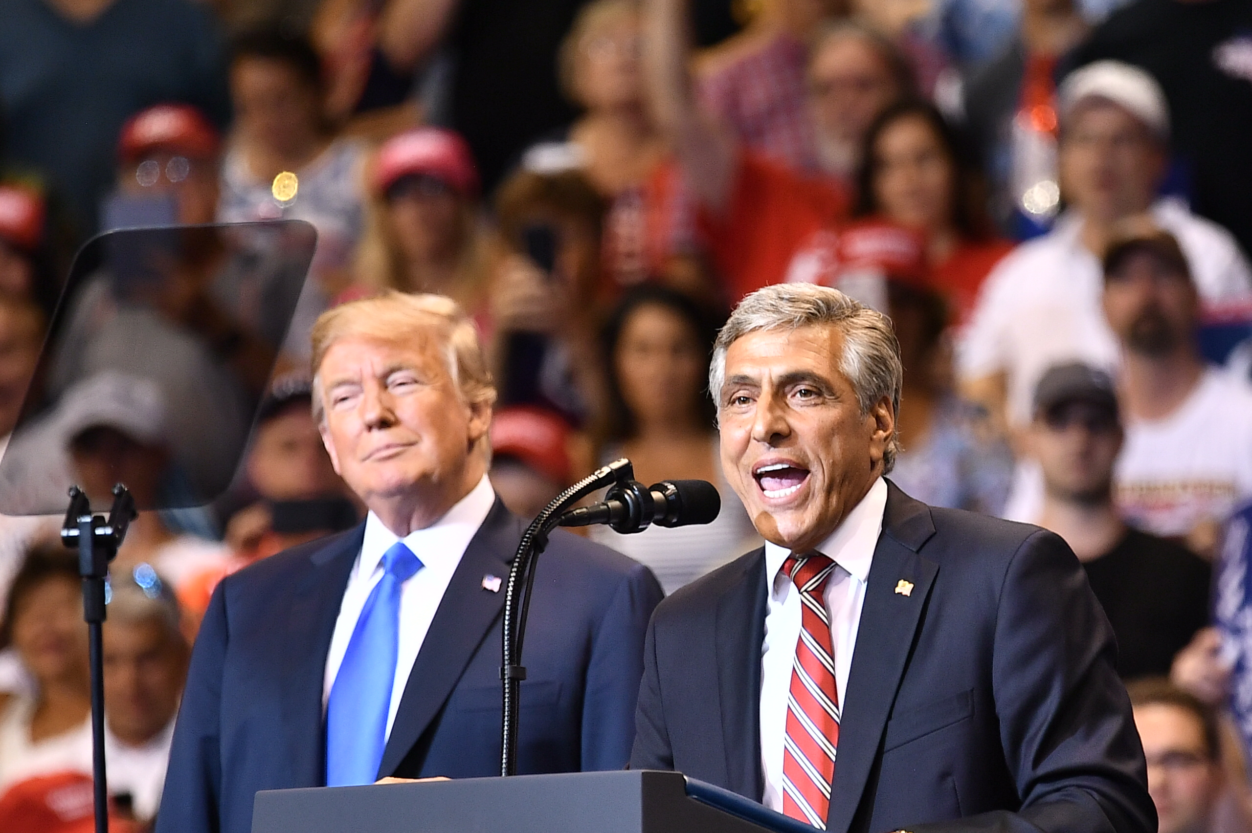 Republican Senate candidate Lou Barletta speaks in front of US President Donald Trump at a political rally in Pennsylvania