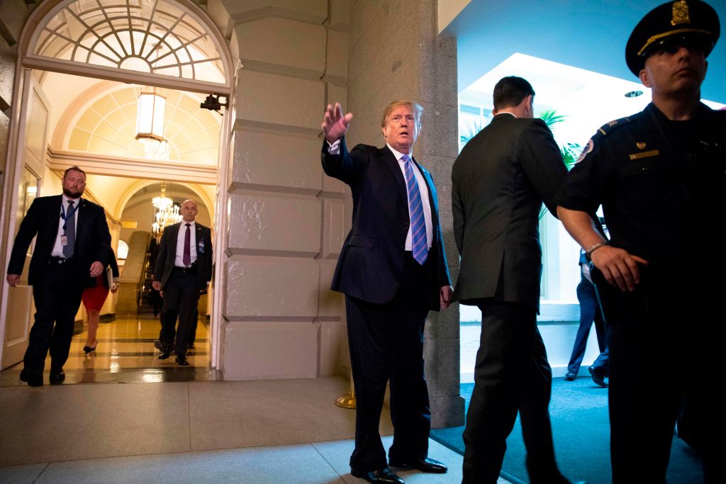 US President Donald Trump arrives for a meeting with Republican members of Congress at the US Capitol in Washington, DC on June 19, 2018. 