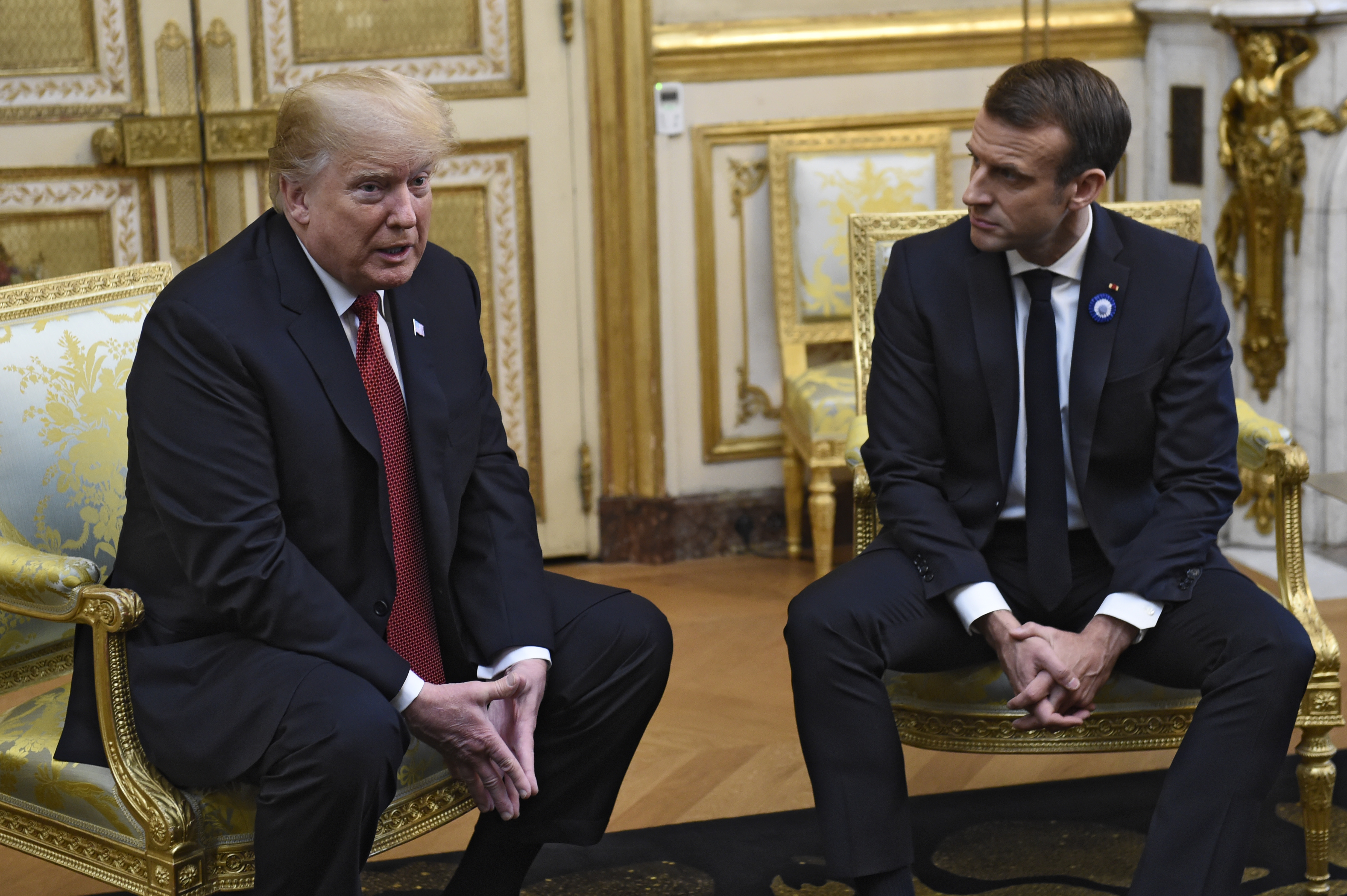 US President Donald Trump and French President Emmanuel Macron speak at the Elysee Palace ahead of bilateral talks.