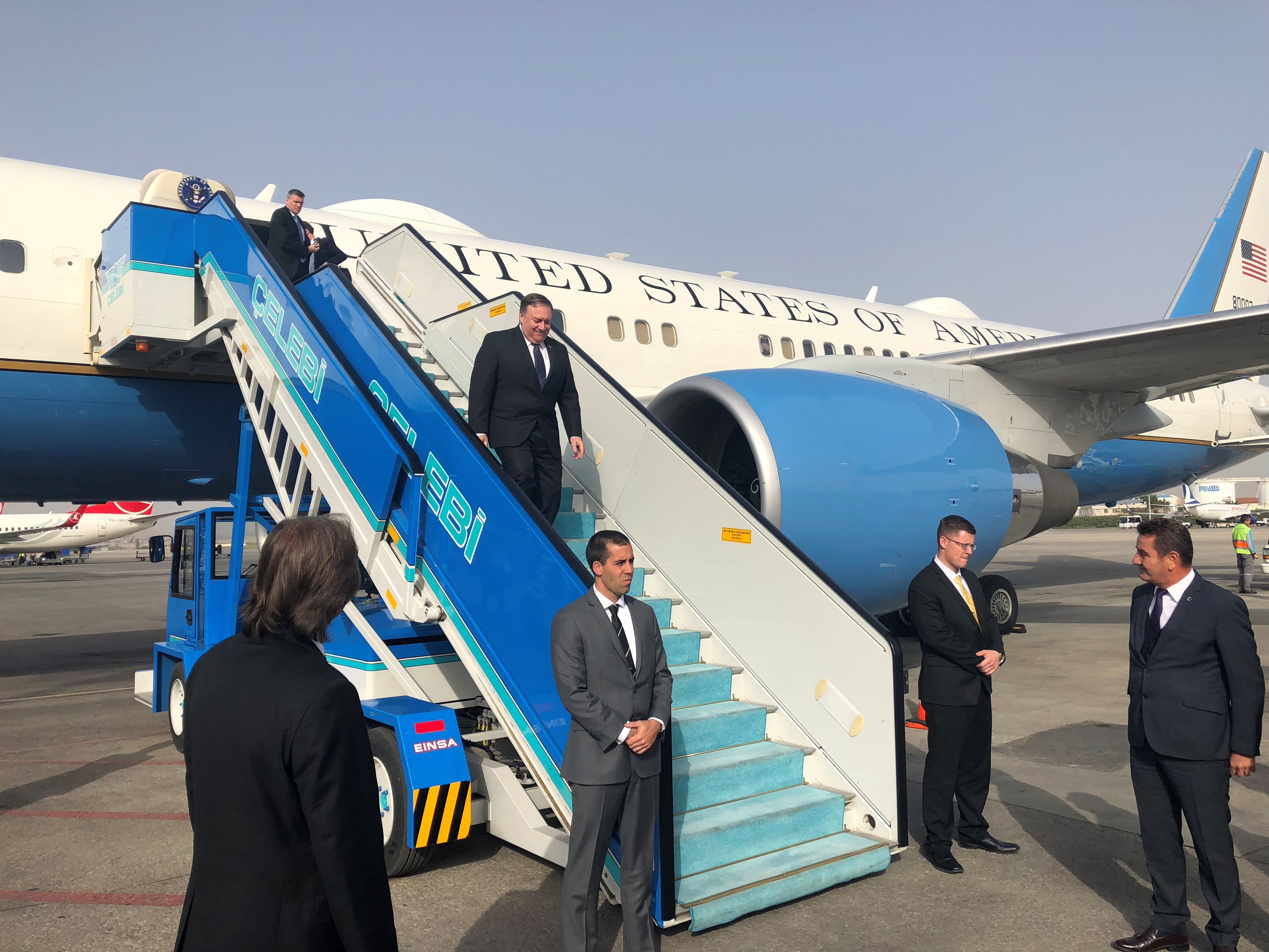 Secretary of State Mike Pompeo steps off his plane after arriving in Turkey.