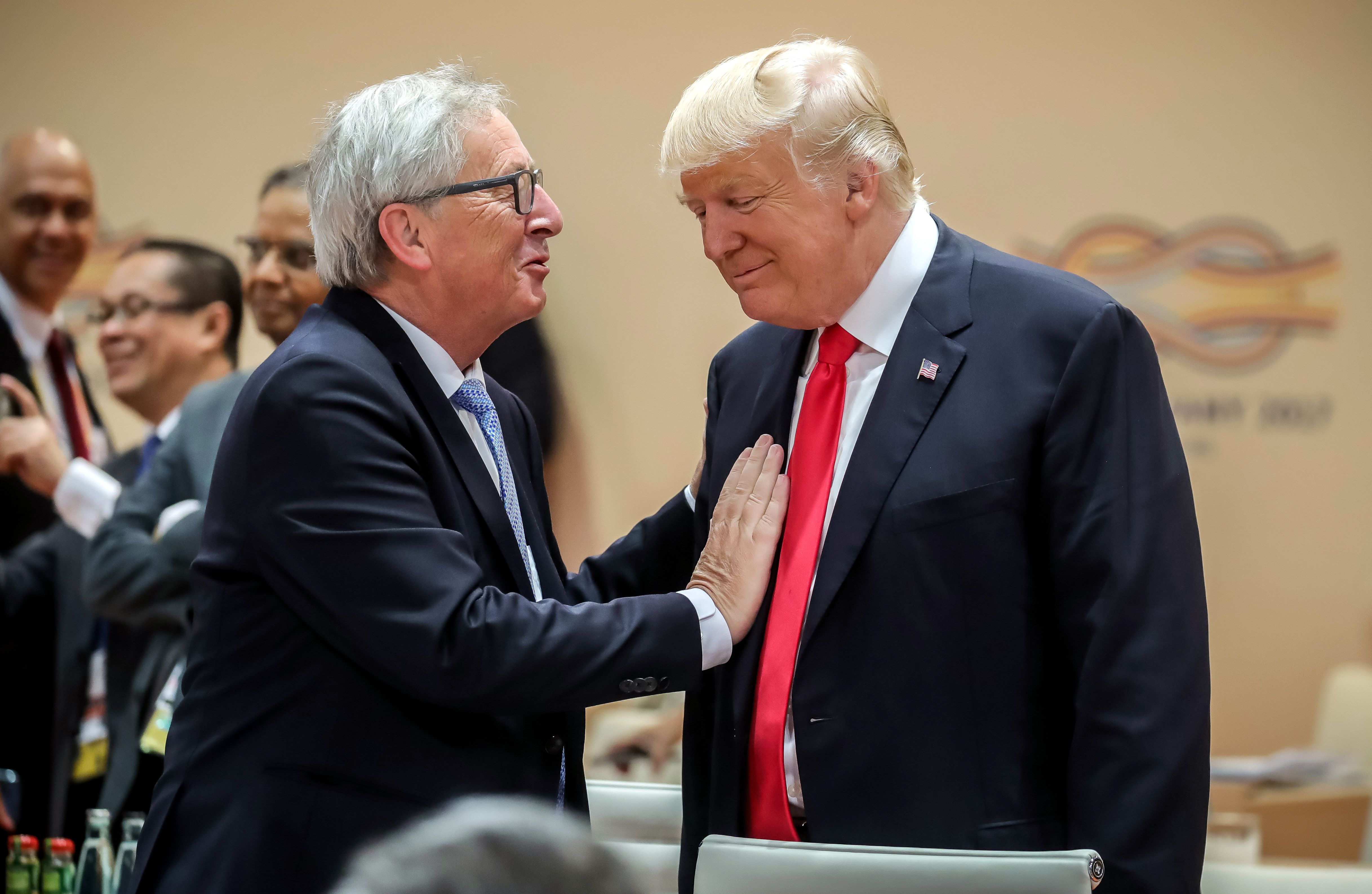 European Commission President Jean-Claude Juncker and President Trump talk at the 2017 G20 Summit in Hamburg, Germany.