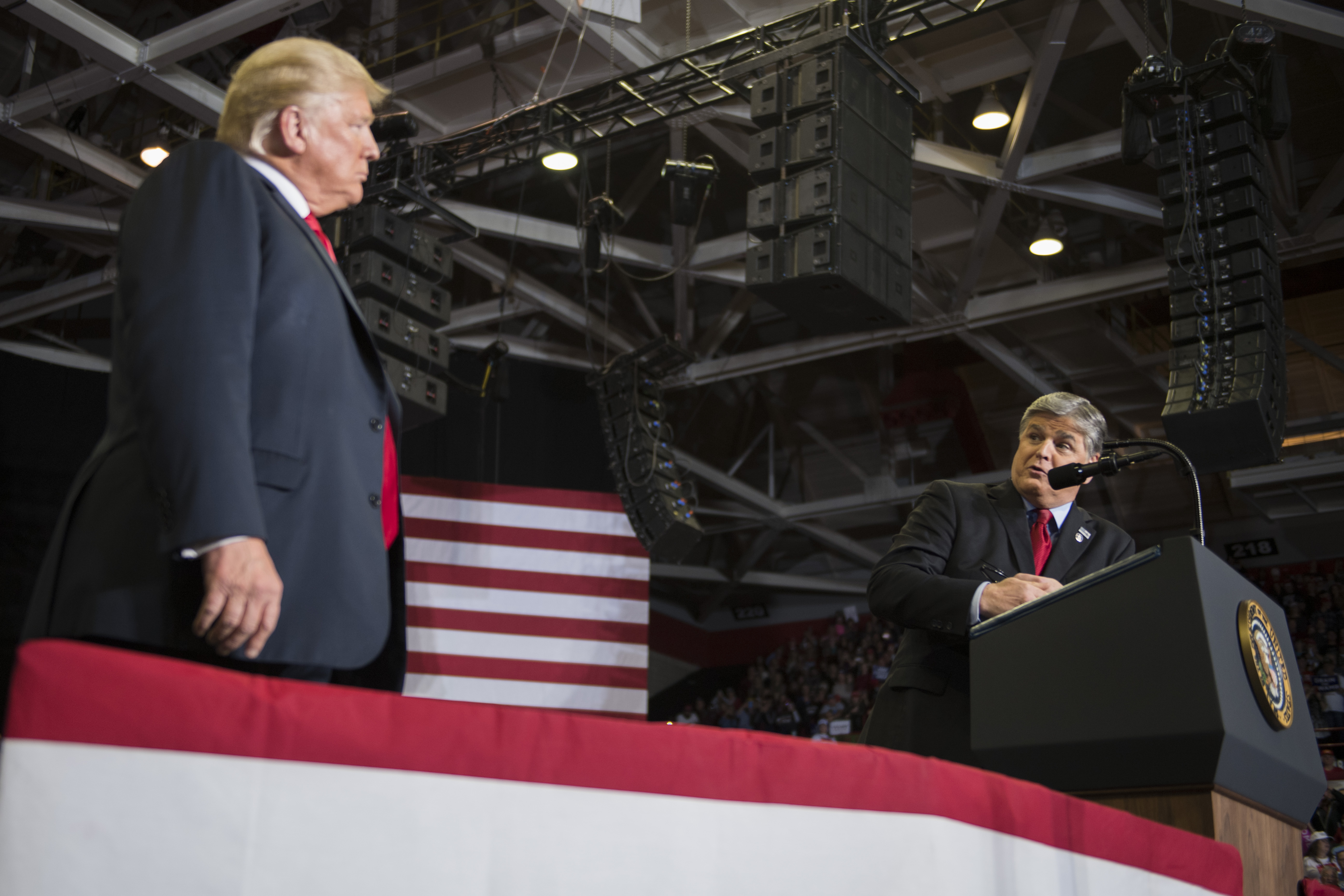 Sean Hannity speaks alongside President Donald Trump at a Make America Great Again rally on Monday in Cape Girardeau, Missouri.