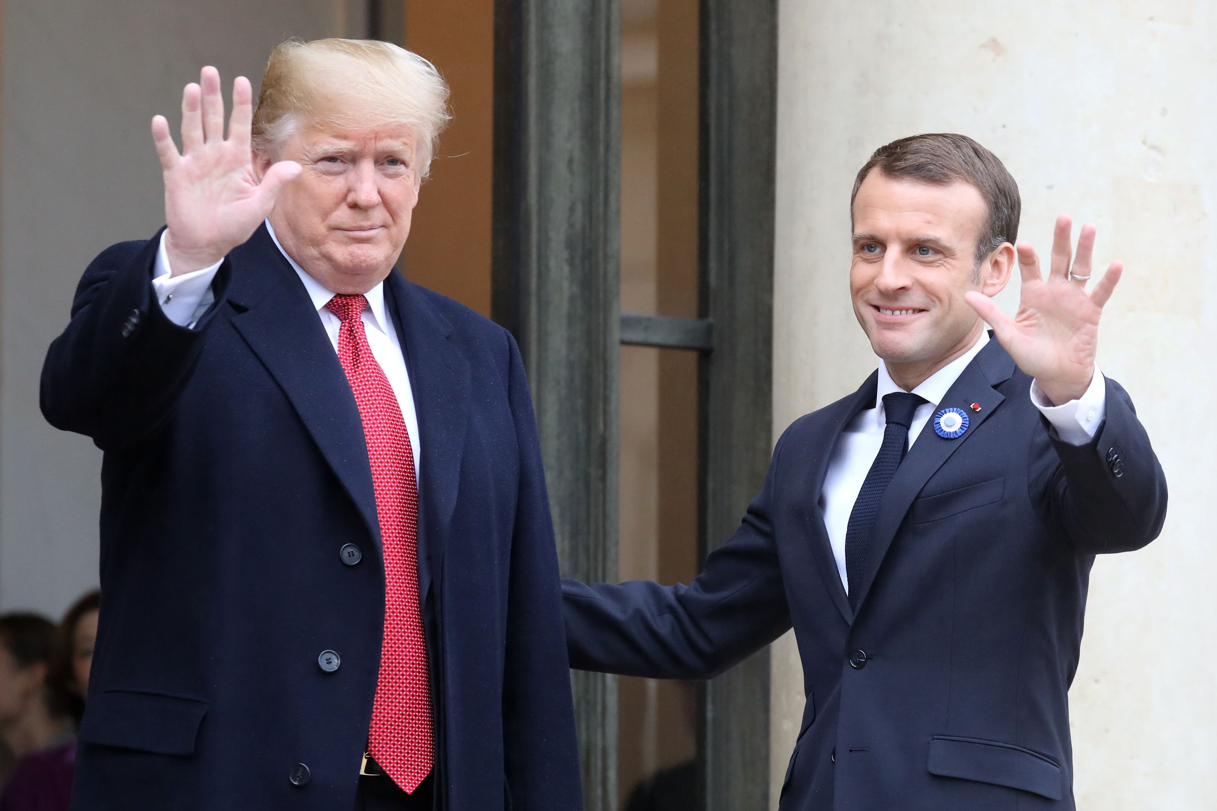 US President Donald Trump is welcomed by French President Emmanuel Macron to the Elysee Palace in Paris.