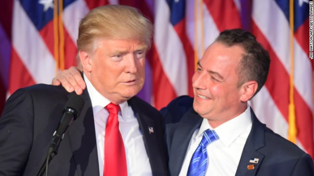 In this file photo, Reince Priebus hugs then-presidential-elect Donald Trump during election night at the New York Hilton Midtown in New York on Nov. 9, 2016.