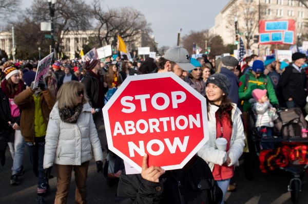 Anti-abortion activists participate in the March for Life on Friday. 