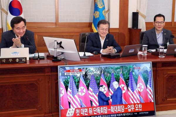President Moon watching the North Korean and US Summit in Singapore from his cabinet meeting in Seoul, on June 12.