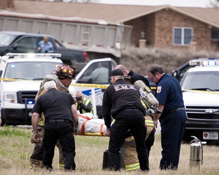texas crash suspect on stretcher