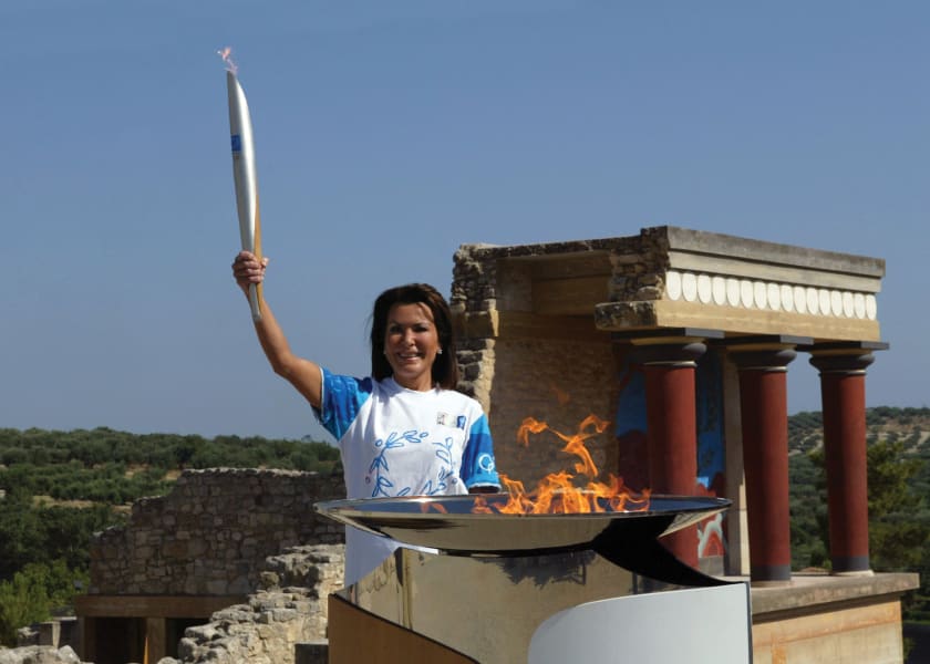 NEWGianna Angelopoulos with Olympic torch at Knossos