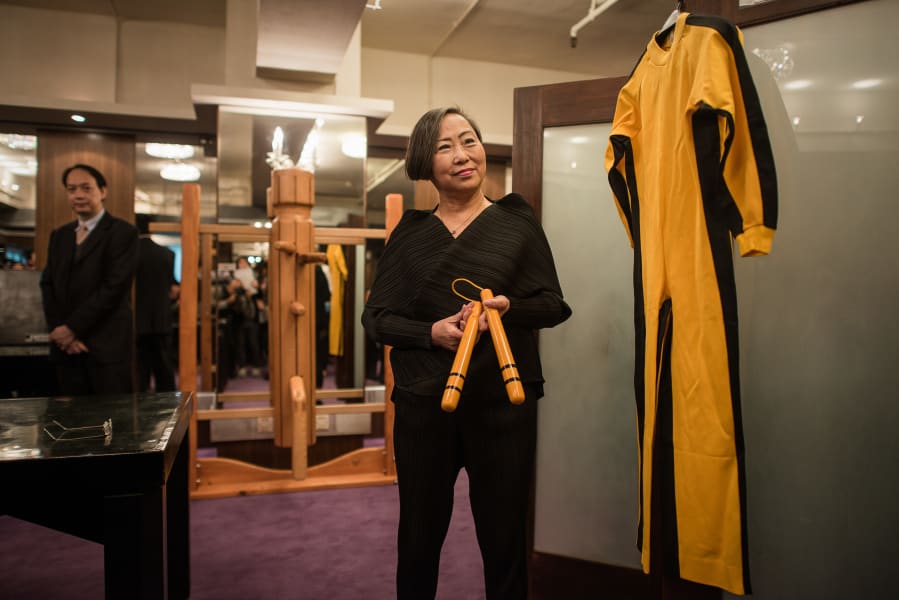 bruce lee yellow nunchucks