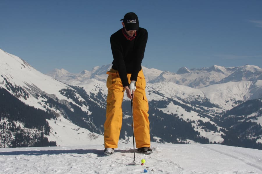 snow golf gstaad mountains