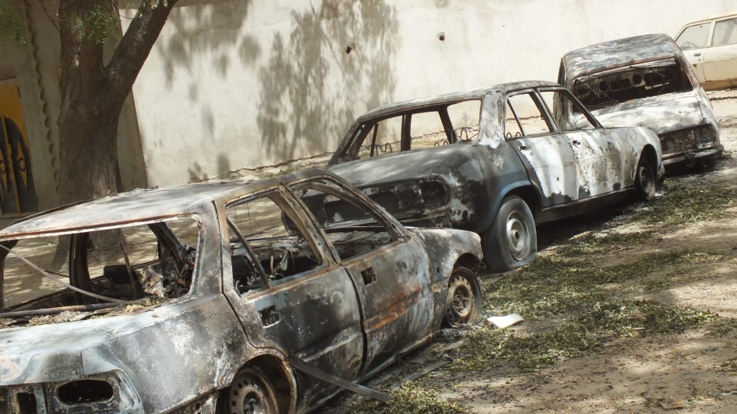 02_SHATTERED CARS OF Fotokol residents