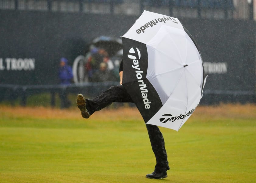 Jamie Donaldson the open day two rain umbrella 