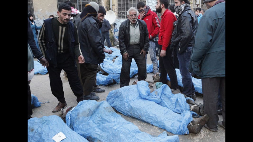 Photos: Bound Bodies Found In River In Syria