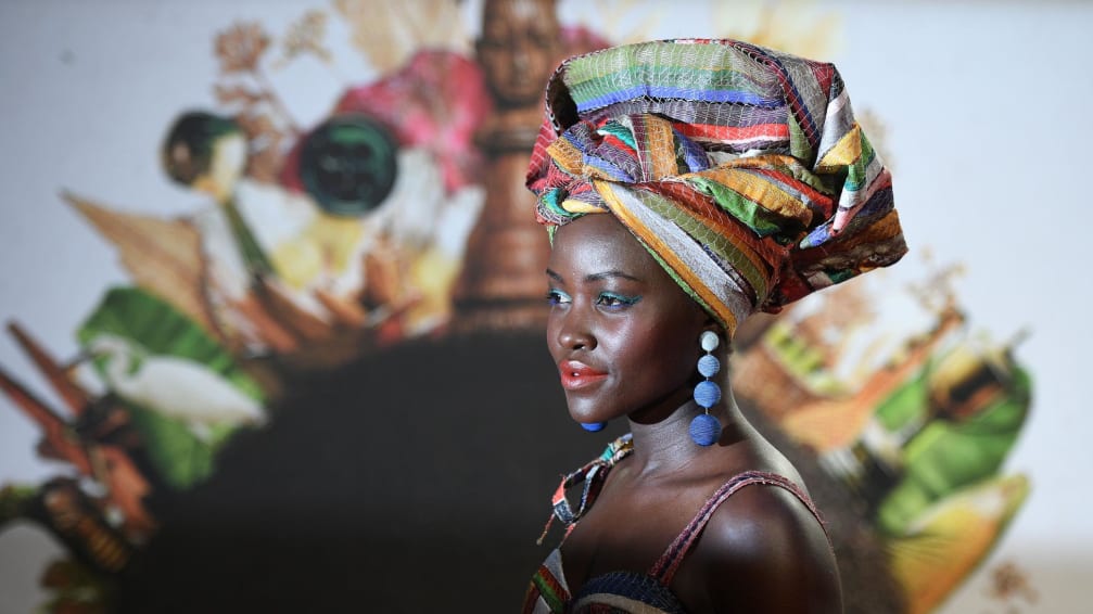 Kenyan actress Lupita Nyong'o poses on the red carpet after arriving to attend a gala screening of the film "Queen of Katwe" during the BFI London Film Festival in London on October 9, 2016. / AFP / Justin TALLIS        (Photo credit should read JUSTIN TALLIS/AFP via Getty Images)