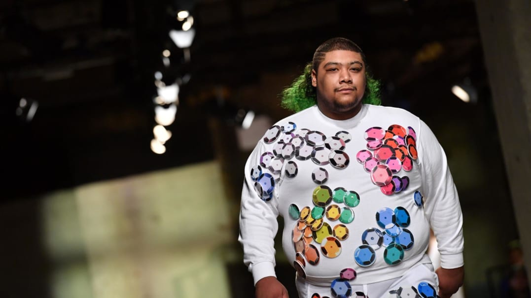 A model presents a creation from the designers at Rottingdean Bazaar, as part of the MAN collection, during a catwalk show on the third day of the Autumn/Winter 2018 London Fashion Week Men's, in London on January 7, 2018. / AFP PHOTO / Ben STANSALL (Photo credit should read BEN STANSALL/AFP/Getty Images)