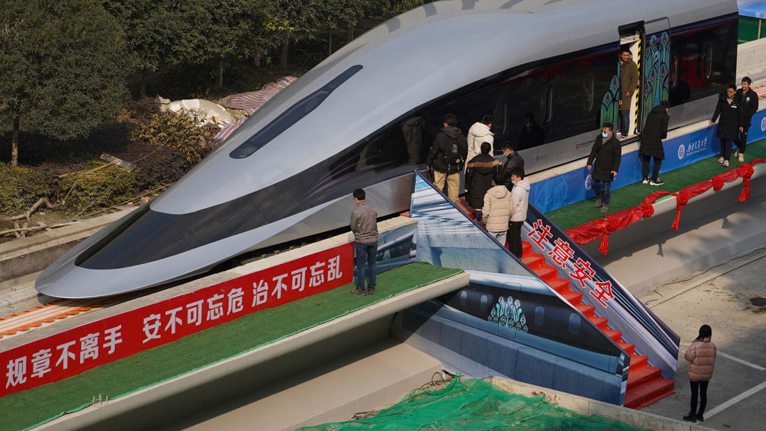 People visit a prototype magnetic levitation train developed with high-temperature superconducting (HTS) maglev technology at the launch ceremony in Chengdu, in southwestern China's Sichuan province on January 13, 2021. (Photo by STR / AFP) / China OUT (Photo by STR/AFP via Getty Images)