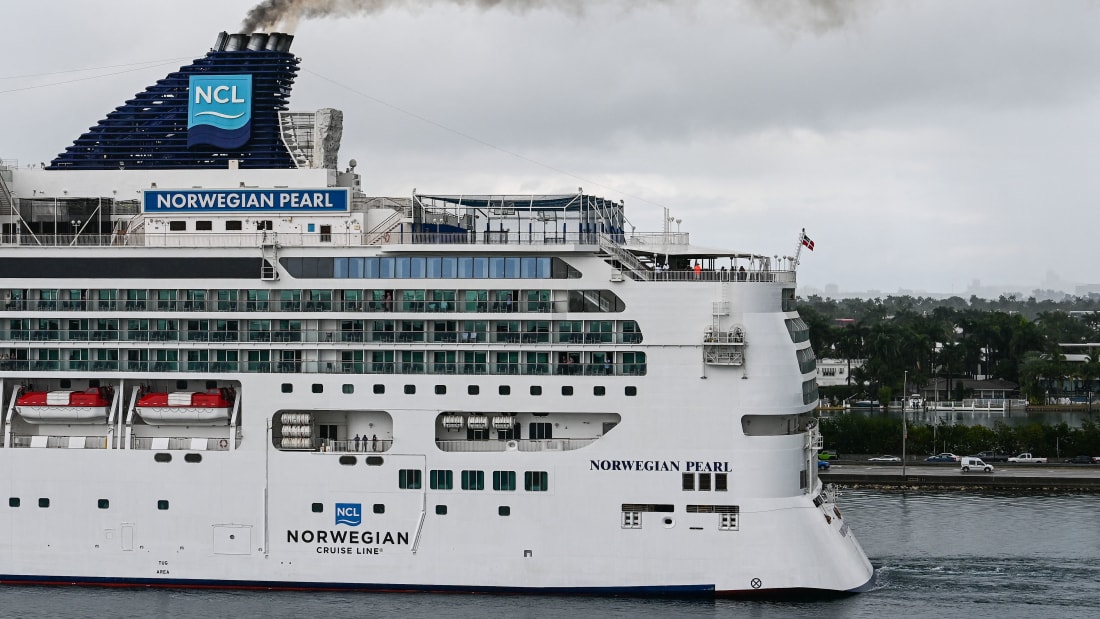 Norwegian Cruise Line's "Norwegian Pearl " returns to the Port of Miami in Miami, Florida, on January 5, 2022. - The cruise ship returned after only one day out at sea after several crew members tested positive for Covid-19. (Photo by CHANDAN KHANNA / AFP) (Photo by CHANDAN KHANNA/AFP via Getty Images)