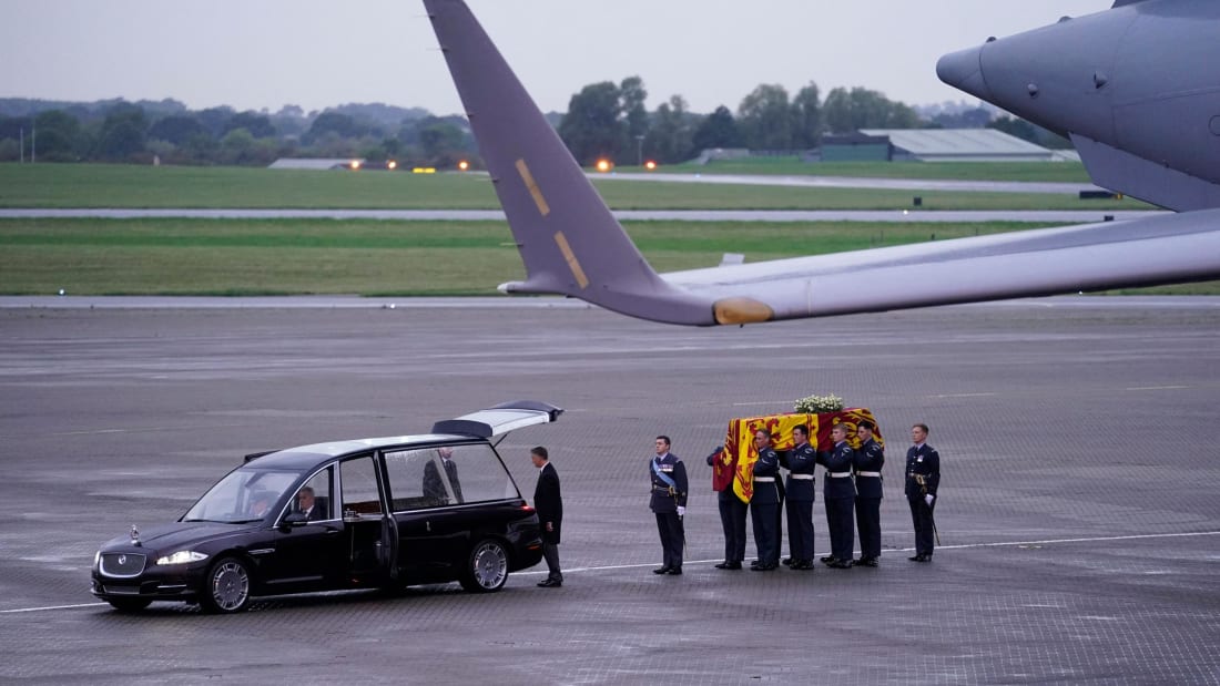 Pallbearers from the Queen's Colour Squadron (63 Squadron RAF Regiment) leave having carried the coffin of Queen Elizabeth II to the Royal Hearse having removed it from the C-17 at the Royal Air Force Northolt airbase on September 13, 2022, before it is taken to Buckingham Palace, to rest in the Bow Room. - Mourners in Edinburgh filed past the coffin of Queen Elizabeth II through the night, before the monarch's coffin returns to London to Lie in State ahead of her funeral on September 19. (Photo by Andrew Matthews / POOL / AFP) (Photo by ANDREW MATTHEWS/POOL/AFP via Getty Images)
