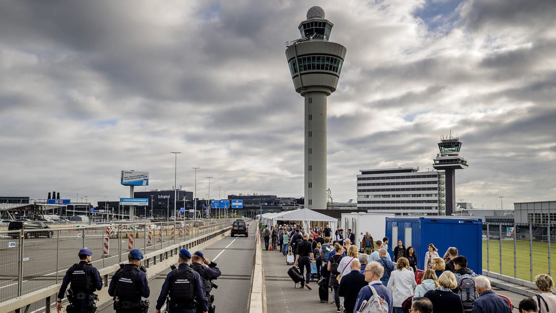 Travelers queue outside Schiphol airport, on September 13, 2022, after Schiphol Airport asked a number of airlines to cancel flights due to a shortage of security personnel. - Netherlands OUT (Photo by Sem van der Wal / ANP / AFP) / Netherlands OUT (Photo by SEM VAN DER WAL/ANP/AFP via Getty Images)