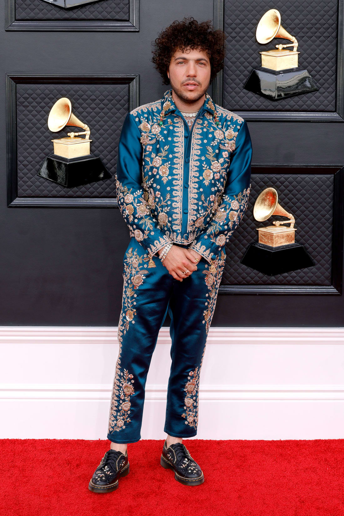 Muisc producer Benny Blanco arrived in an elaborately embroidered outfit with bejeweled shoes. 