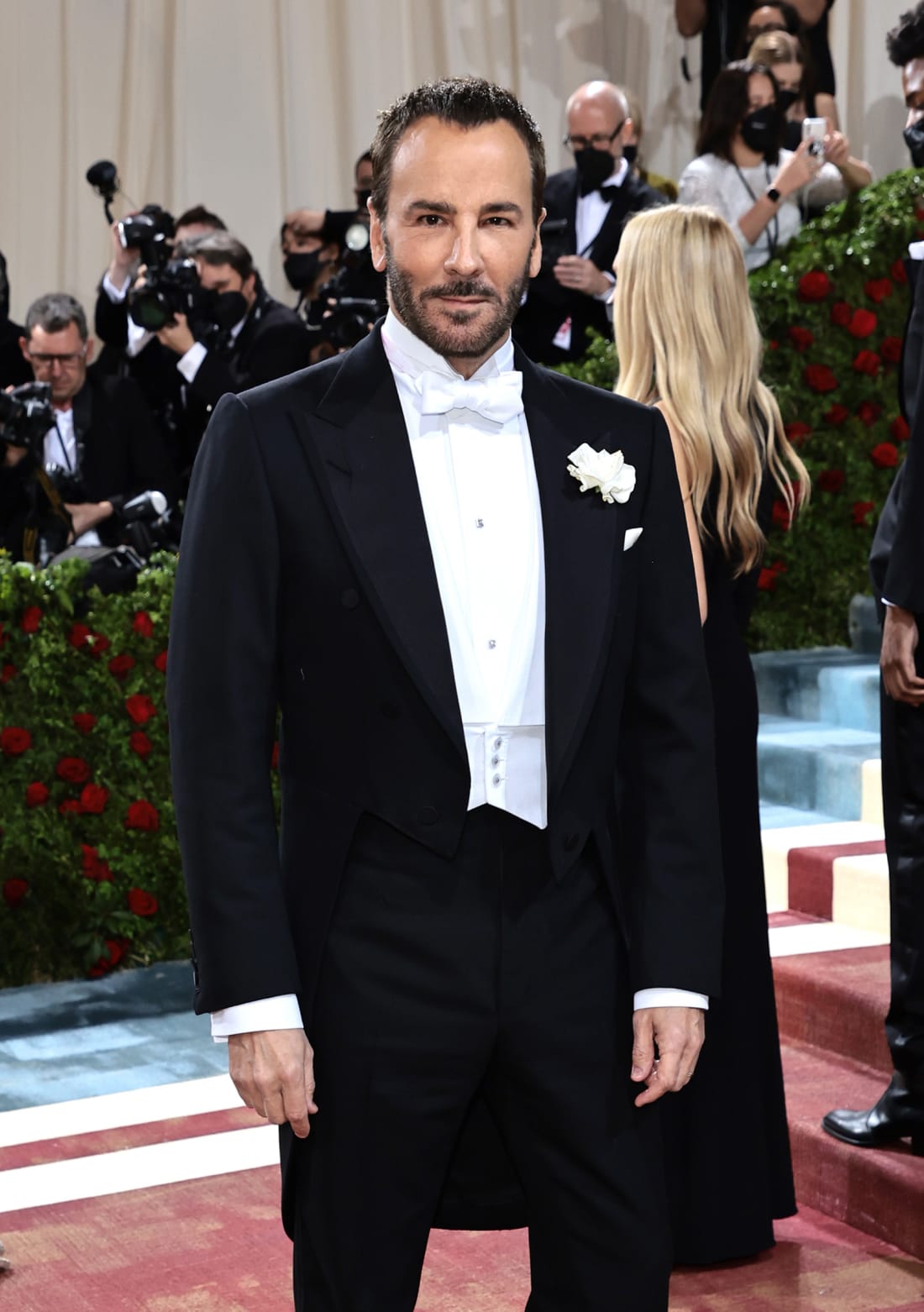 Designer Tom Ford naturally wore an outfit by his own brand, choosing a white-tie suit for the event. 