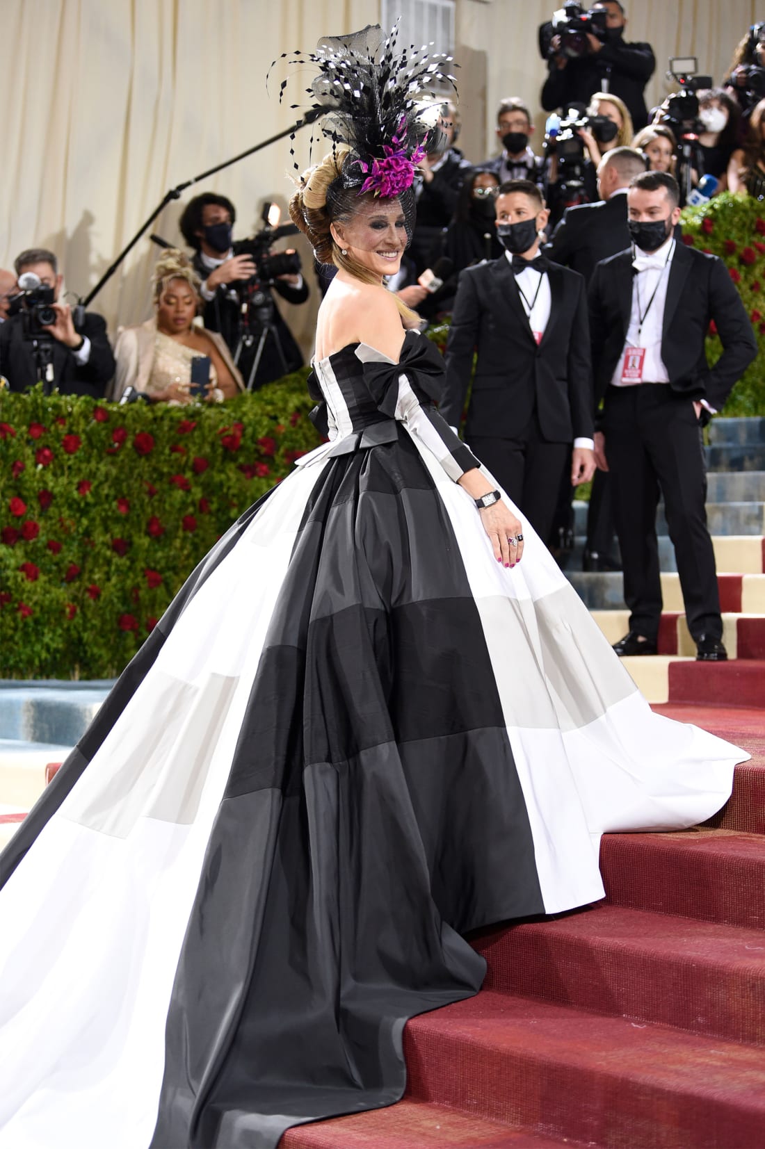 Sarah Jessica Parker in a black-and-white Christopher John Rogers dress with a structure 19th-century-style skirt and a feathered headpiece by milliner Philip Treacy.