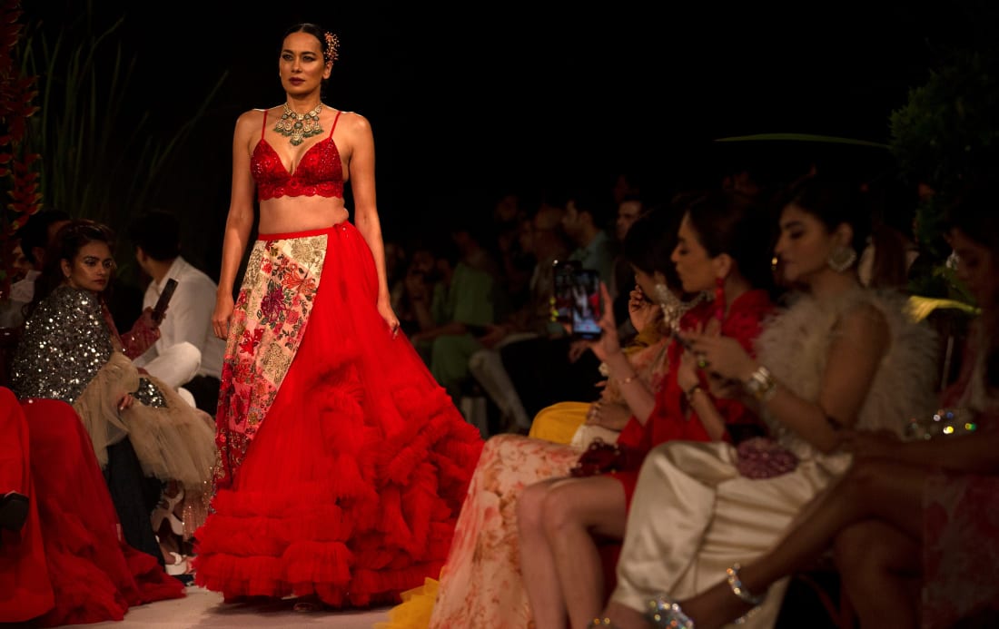 A model presents a creation of Varun Bahl during the FDCI India Couture Week in New Delhi, India, on July 26, 2022. 