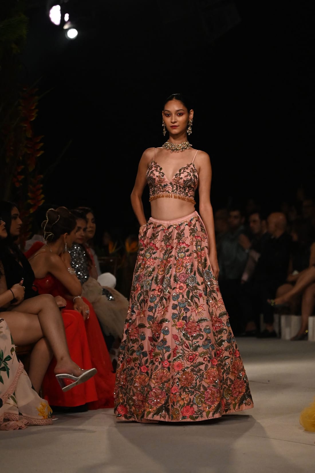 A model presents a creation by designer Varun Bahl during the FDCI India Couture Week in New Delhi on July 26, 2022.