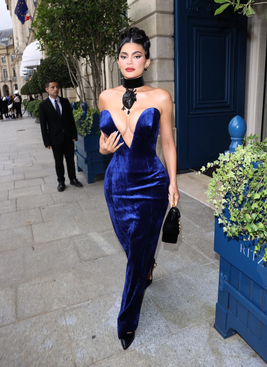 Kylie Jenner was spotted at the Schiaparelli presentation in a vampyric blue velvet dress.
