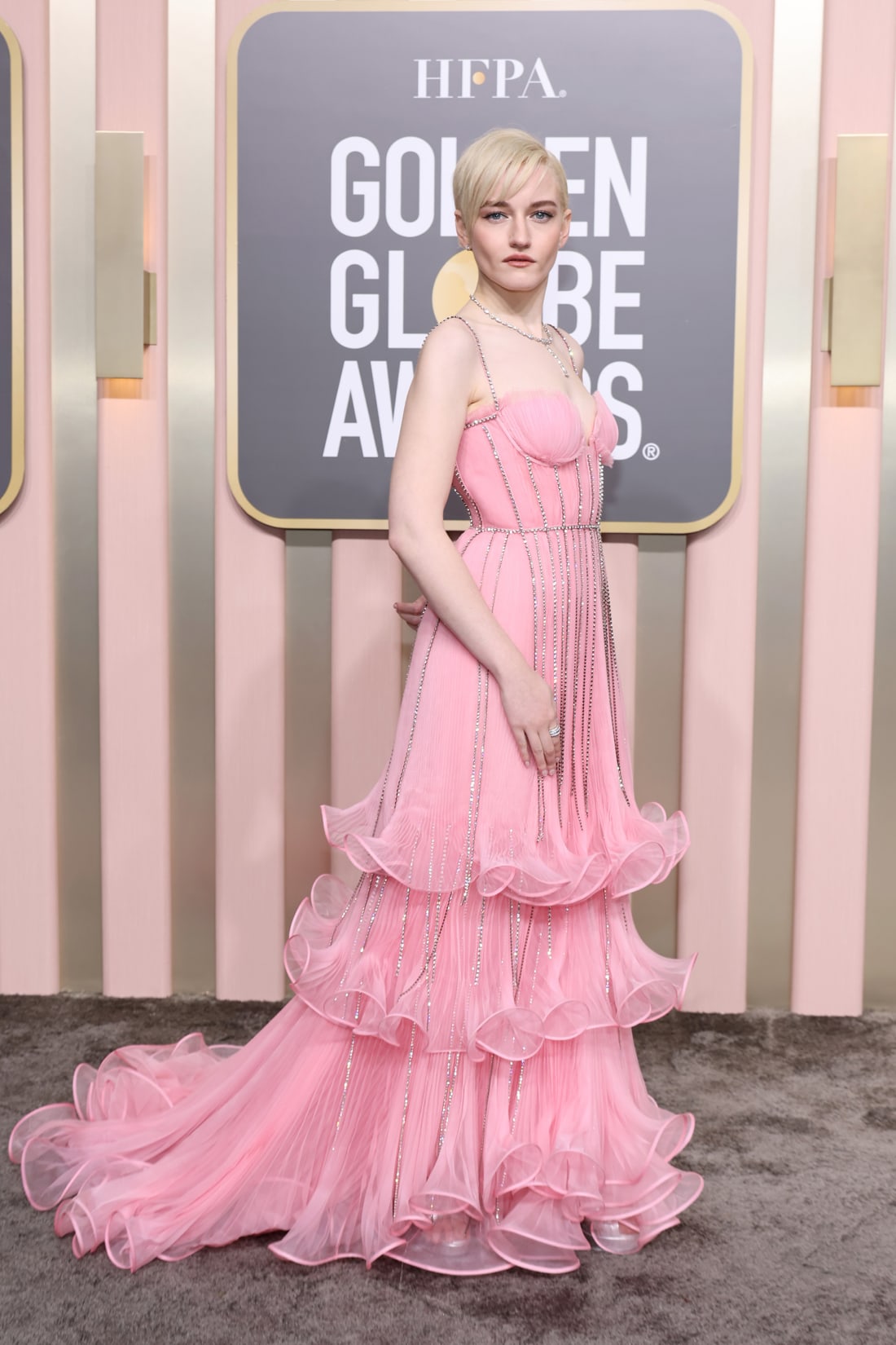 Double nominee Julia Garner in a three-tiered Gucci gown.