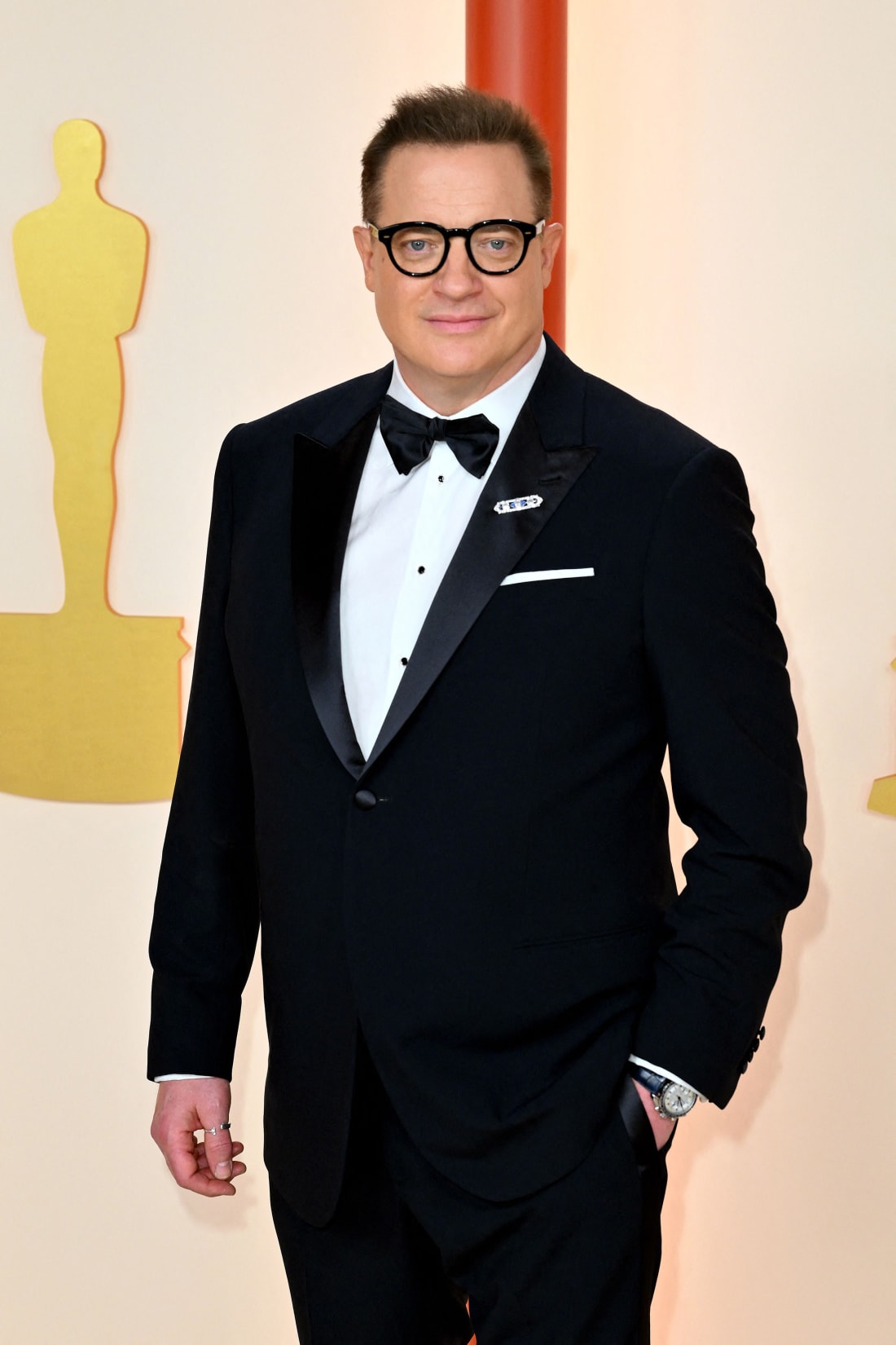 Brendan Fraser, Best Leading Actor nominee for his role in 'The Whale,' wore a Giorgio Armani suit topped off with a bow tie.