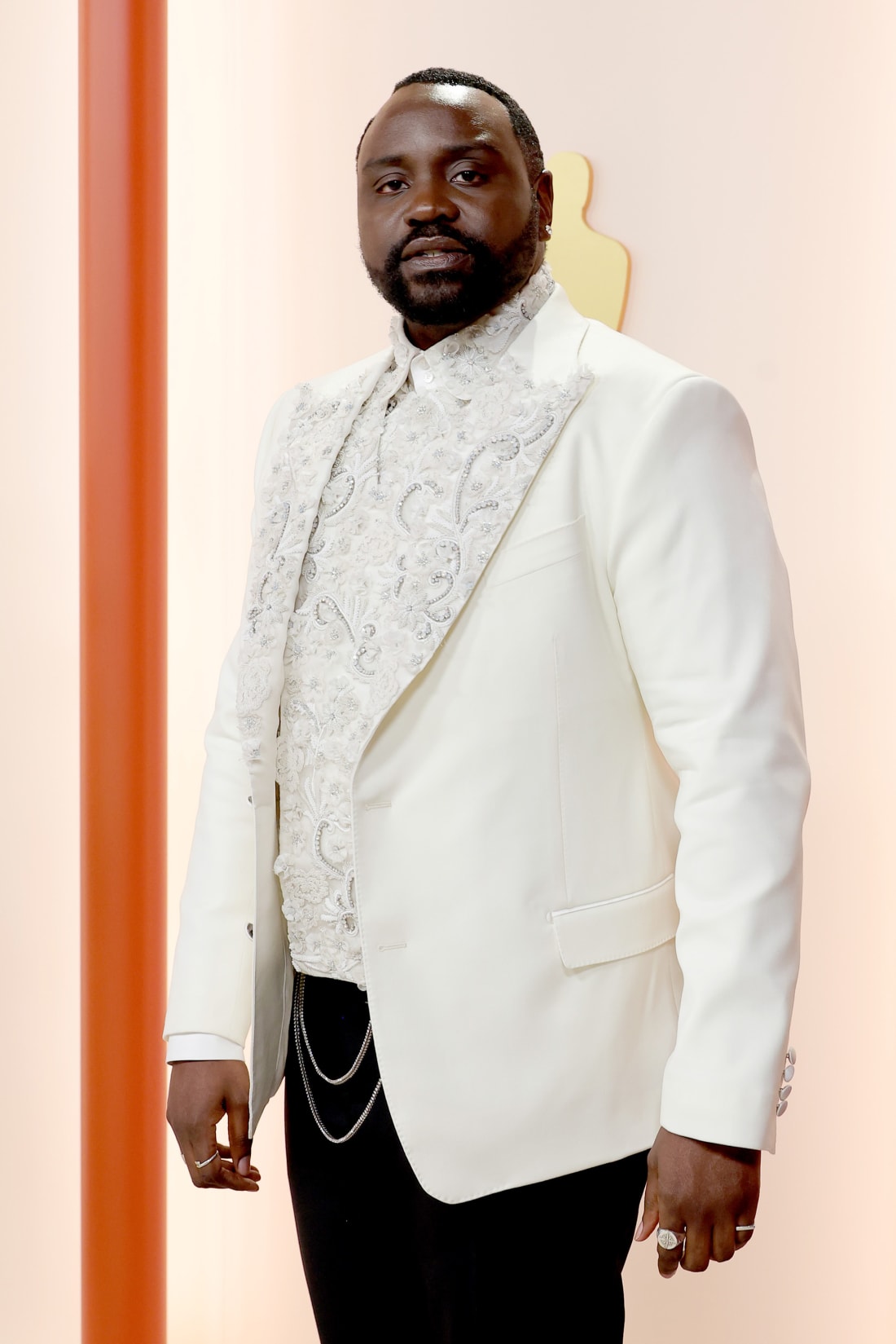 Brian Tyree Henry, nominated for Best Supporting Actor, wore a white double-breasted jacket with floral embellishments. 
