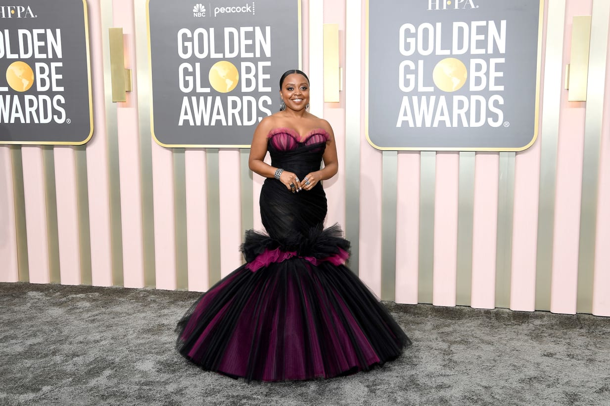 Quinta Brunson in a figure-hugging Christian Siriano dress on her way to winning a best actress award for "Abbott Elementary."