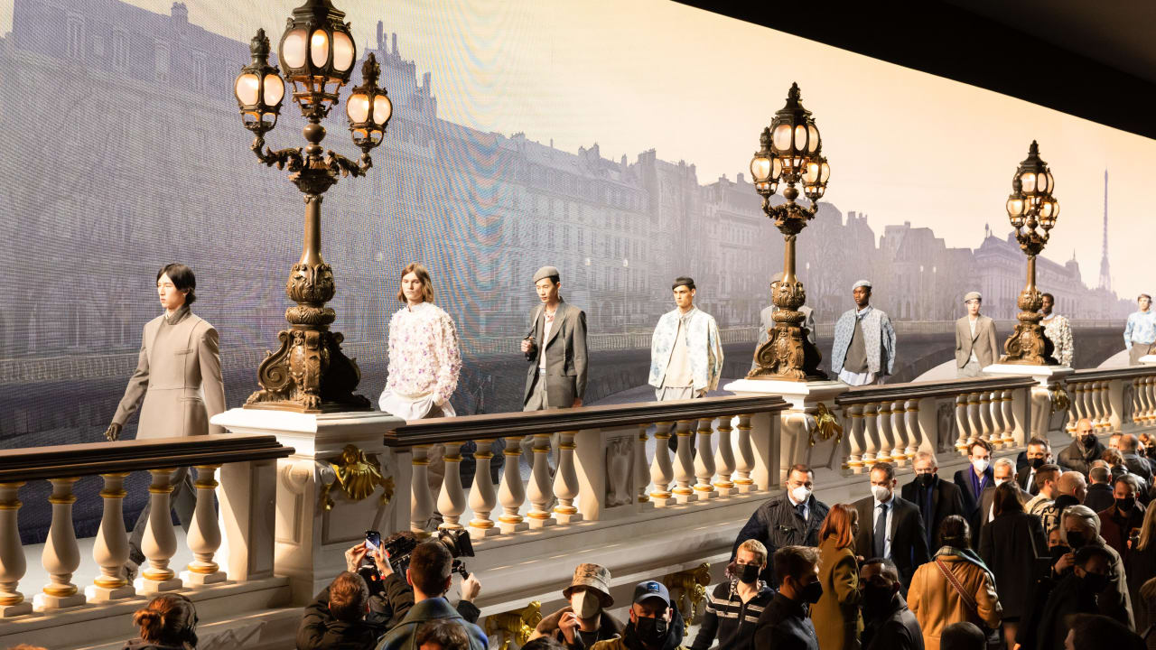 Models pose on the runway during the finale of the Dior Homme Menswear Fall/Winter 2022-2023 show as part of Paris Fashion Week on January 21, 2022 in Paris.