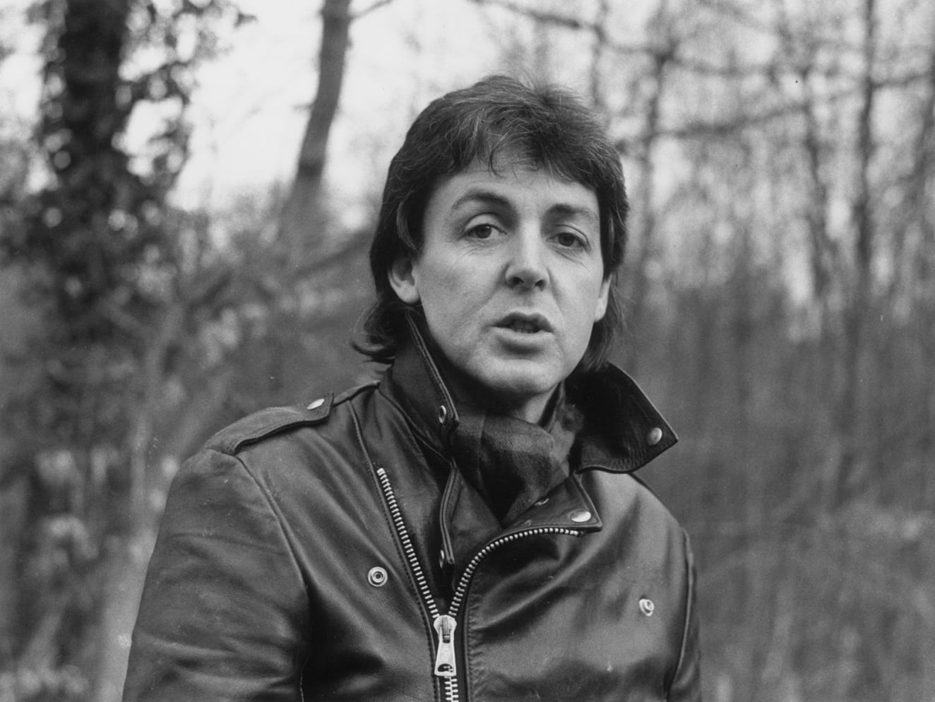 A classic biker jacket never goes amiss, as demonstrated by McCartney here in 1980 at his farm near Rye, Sussex. 