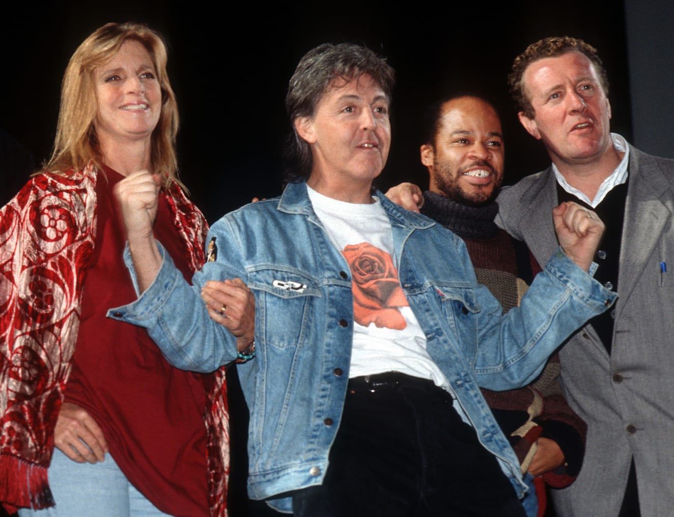 By 1993, the singer had ditched the '70s lapels and moved with the times. Here during a rehearsal for his New World Tour at the Docklands Arena in London  McCartney poses in a typically '90s oversized denim jacket and graphic tee.