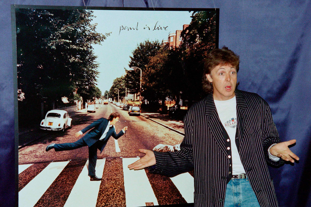 A good suit jacket is a staple, especially when dressed down with a simple T-shirt. McCartney is pictured in 1993 at the Palais Omnisports de Paris Bercy.