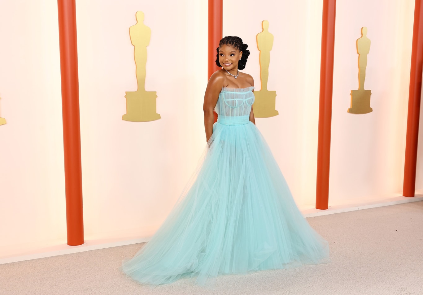 Halle Bailey wore an aqua-colored Dolce & Gabbana princess dress with De Beers jewelry. 