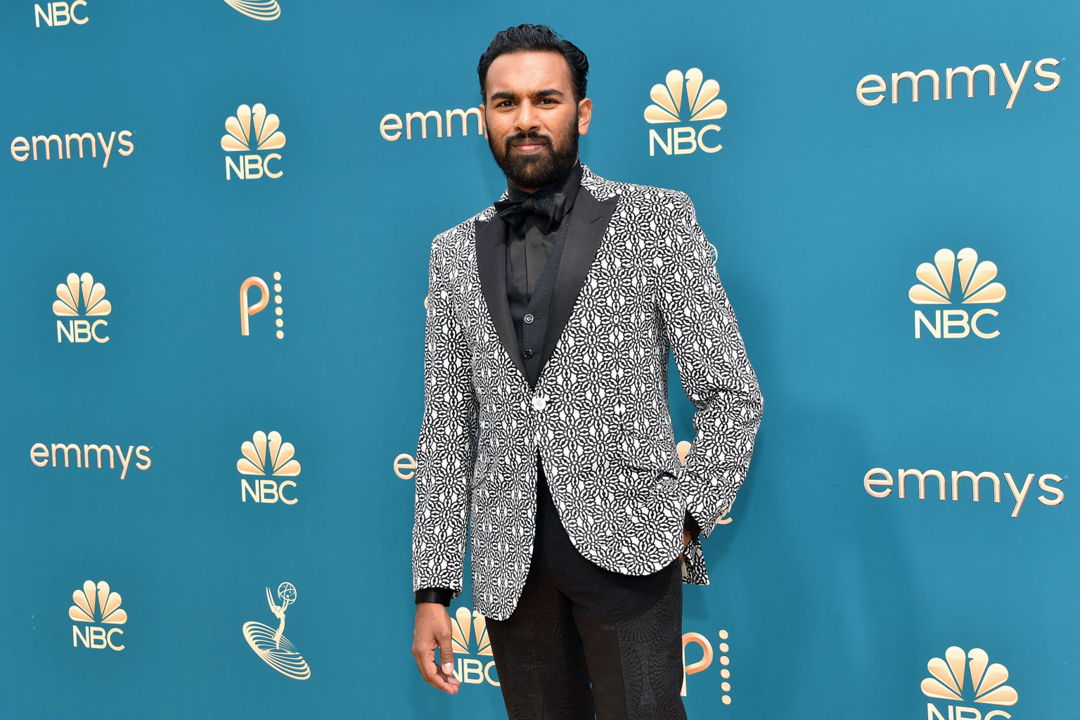 British actor Himesh Patel, nominated for his role in "Station Eleven," wore a patterned tuxedo jacket with an otherwise all-black ensemble. 