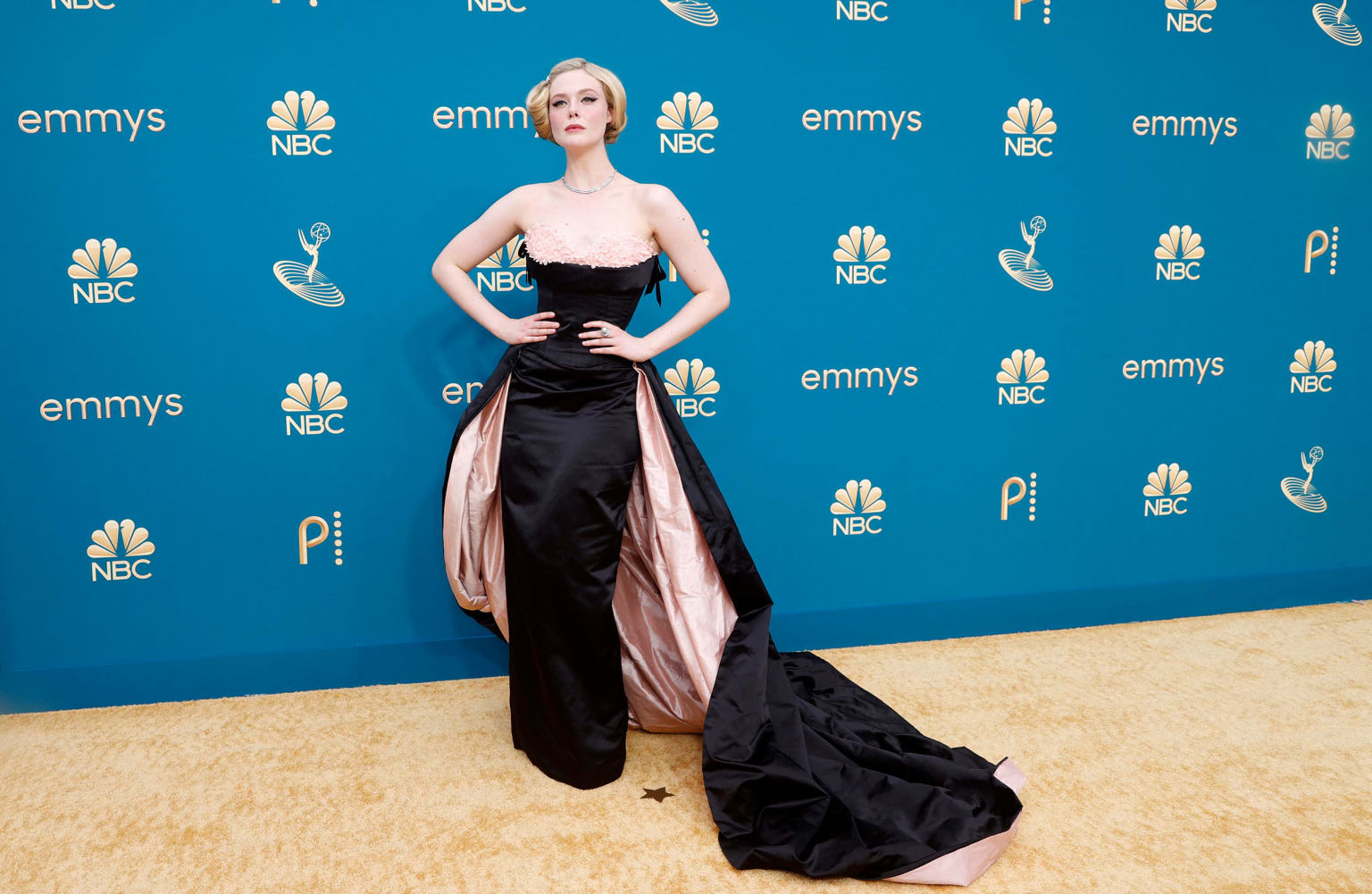 Elle Fanning channeled old Hollywood glamour in a strapless black and pink dress designed by "The Great" costume designer Sharon Long. 