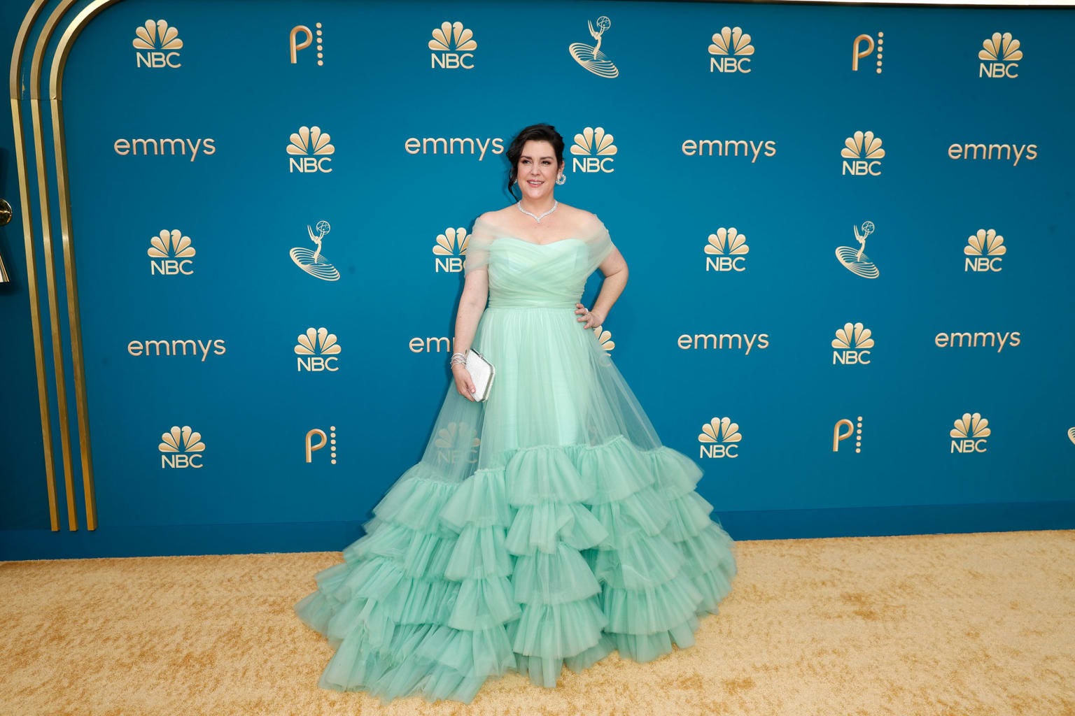 Melanie Lynskey in a tiered tulle gown by Christian Siriano. 