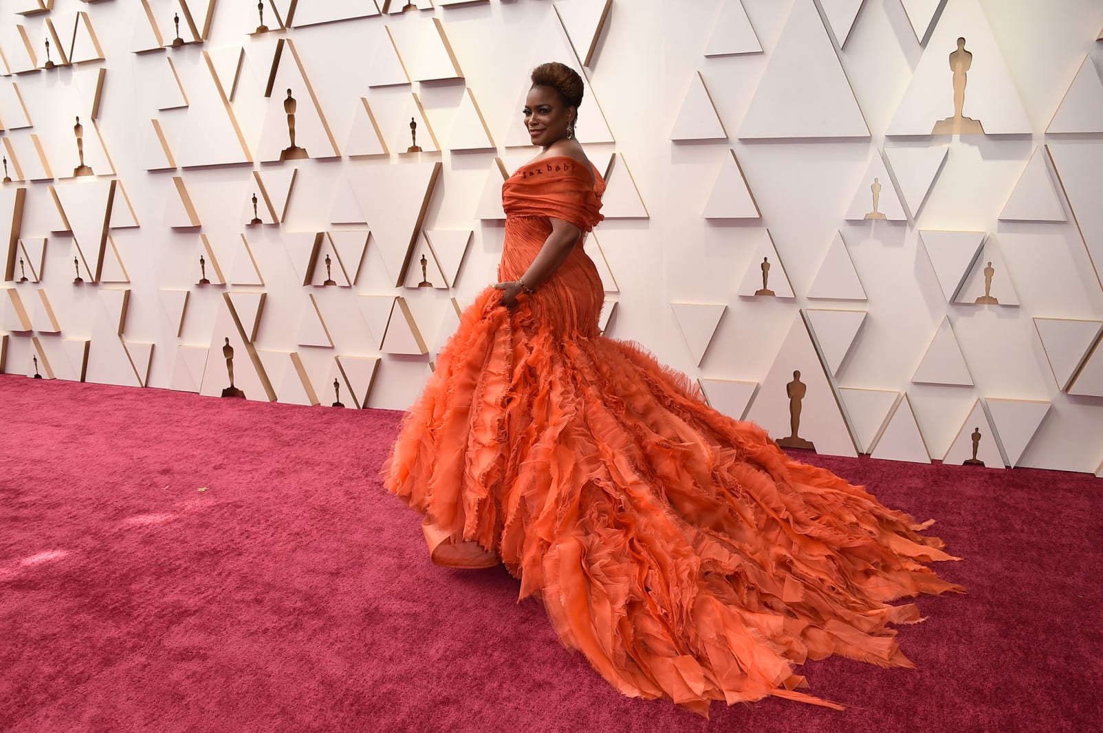 Aunjanue Ellis, nominated for best supporting actress for her performance in "King Richard," in an orange Versace gown.