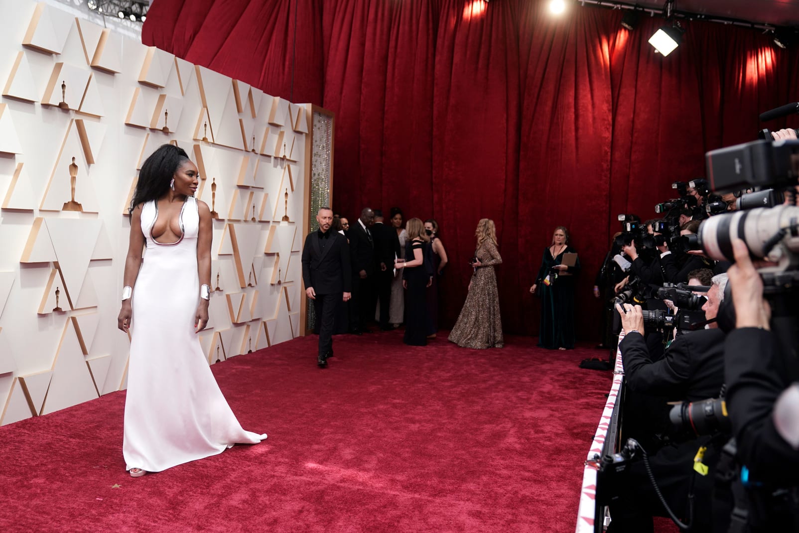 "King Richard" co-executive producer Venus Williams in a white Elie Saab gown with silver accents. 